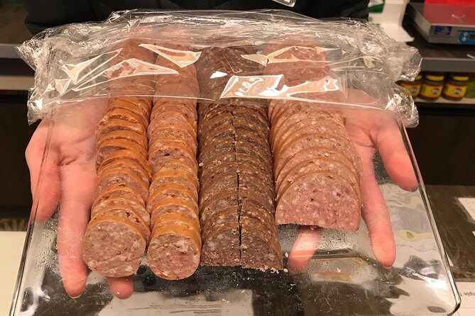 Anchorage City Tour w/ Taste of Wild Smoked Salmon & Reindeer Sausage - Scenic waterfalls pullouts near Beluga Point and Falls Creek